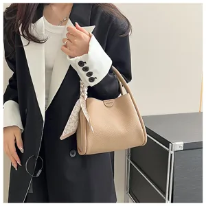Korean style soft PU leather handbag for women, large capacity shoulder and crossbody bag.