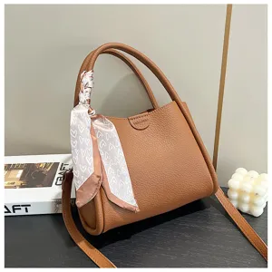 Stylish Korean soft PU leather shoulder bag with chic heart print scarf and strap.