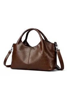 Stylish dark brown soft leather handbag for women, lightweight commuter messenger bag.