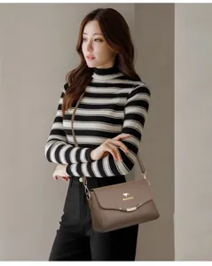 Brown leather women crossbody bag with metal clasp and elegant shoulder strap design.