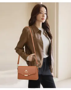 Stylish brown leather women crossbody shoulder bag with elegant design and durable strap.