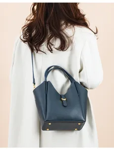 Genuine leather bucket shoulder bag for women, stylish litchi pattern cross body tote.