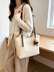 Chic minimalist tote bag for women, large capacity PU leather shoulder bag for daily commute.