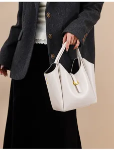 Genuine leather litchi pattern bucket bag, elegant women's shoulder handbag for daily wear.