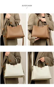 Elegant women's leather handbag with top handle and crossbody strap, perfect for daily commuting.