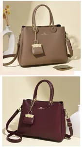 Soft leather large capacity handbag versatile shoulder bag with coin purse pendant for women.