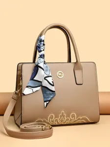Khaki embroidered tote bag for women, stylish top handle satchel with scarf and strap.
