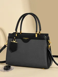 Elegant black shoulder tote bag with top handles and gold hardware for daily office wear.