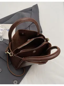 Stylish brown PU leather women shoulder bag, large capacity bucket tote for daily wear.