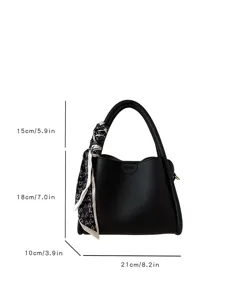 Korean style soft PU leather shoulder crossbody handbag with stylish heart patterned scarf accessory.