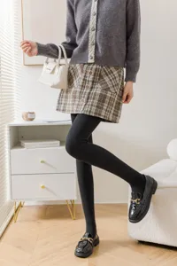 Gray fleece lined pantyhose detail, warm winter tights for women, comfortable daily wear.