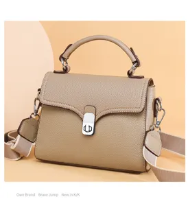 Genuine leather top-handle crossbody bag for women, casual versatile design with broad strap.