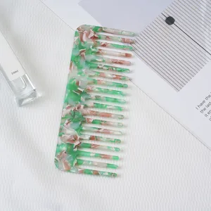 Acetate wide-tooth hair comb with stylish green pink marble pattern, anti-static daily hair styling.