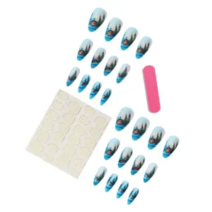 Matte almond press-on nails detail showing winter forest cabin pattern and jelly tabs.