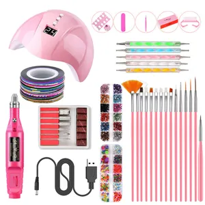 Kit d'outils de nail art professionnel avec lampe UV LED et ponceuse électrique pour manucure.