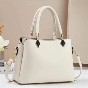 Elegant beige women handbag, large capacity tote bag with top handle and shoulder strap.