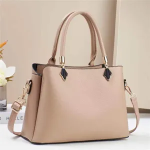 Detailed view of stylish khaki top handle shoulder bag with chic hardware and premium leather.