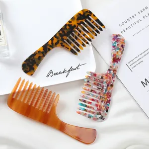 Acetate wide tooth hair comb set featuring leopard print and marble design for daily styling.