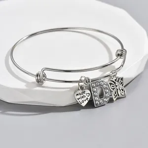 Adjustable silver wire bangle bracelet with rhinestone letter D heart and butterfly charms