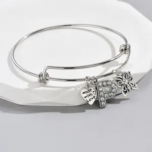 Silver adjustable letter P bangle bracelet detail featuring cute heart and butterfly charms.