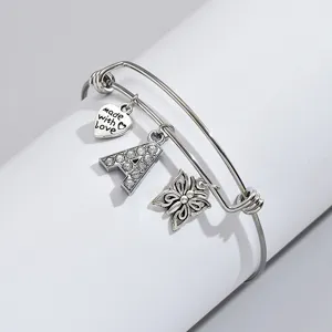 Adjustable silver charm bracelet with letter A rhinestone heart butterfly pendant.