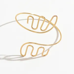 Bracciale da braccio a spirale in metallo dorato polsino aperto minimalista gioiello corpo.