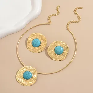 Exaggerated retro turquoise resin pendant choker necklace and earrings set for women.