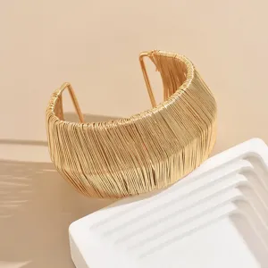Wide gold tone wire wrapped cuff bracelet stylish open metallic fashion statement jewelry item