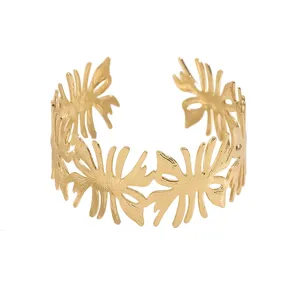 Bracciale polsino aperto dorato alla moda con trama cava a onda, gioiello largo chic.