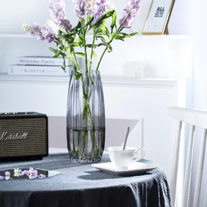 Grey transparent vertical ribbed glass flower vase for home decor and arrangement