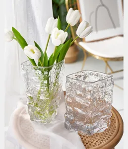Nordic glacier textured clear glass vase for elegant home decor and fresh flower arrangement.