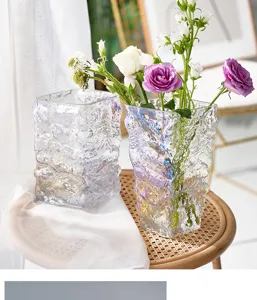 Nordic iridescent glacier glass vase detail showing unique texture and vibrant floral arrangement.