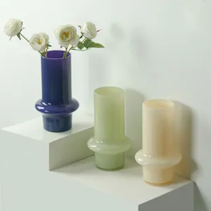 Vintage glass vase set for home decor, colorful cylindrical hydroponic flower arrangement centerpiece.