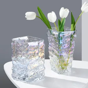Nordic style transparent glass vase iridescent glacier textured floral arrangement decor.