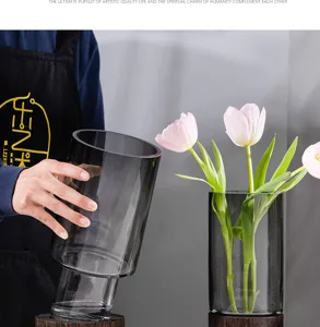 Luxury dark grey glass vase with wooden base, modern minimalist floral decor for home living room.