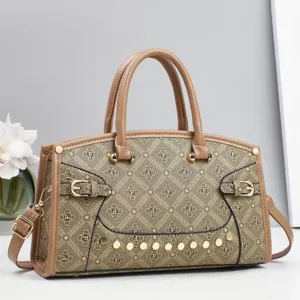 Stylish brown monogram printed handbag with top handle and shoulder strap for women