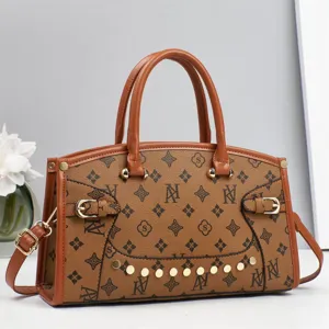 Stylish brown monogram top handle bag with shoulder strap, elegant casual women handbag.