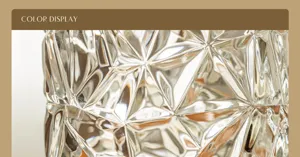 Transparent crystal glass vase with diamond cut texture, exquisite table decor detail shot.