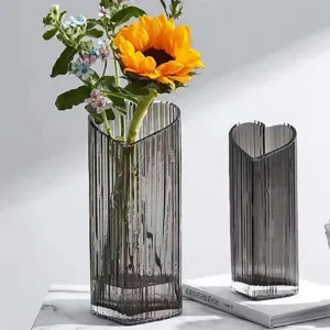 Heart-shaped glass vase grey vertical striped flower arrangement decor piece