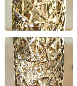 Close-up detail showcasing the exquisite faceted crystal texture and golden amber finish.