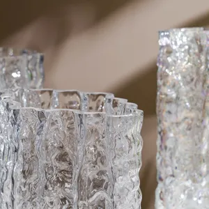 Handmade transparent glass glacier vase, modern luxury flower container for home decor.