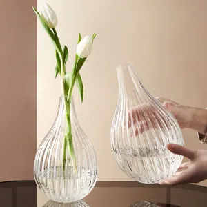Nordic clear glass vase with vertical stripes, perfect for hydroponic flowers and decor.