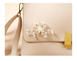 Handmade pearl and rhinestone flower shoe clip decorative accessory, elegant crystal bridal detail.