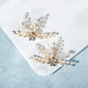 Detail close up shot of pearl crystal shoe clips for bridal wedding shoes decoration.