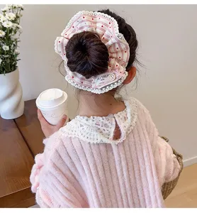 Cute pink striped hair scrunchie with lace trim for cute girls sweet bun hairstyle
