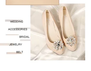 Detailed view of elegant wedding high heels with sparkling crystal flower shoe clips.