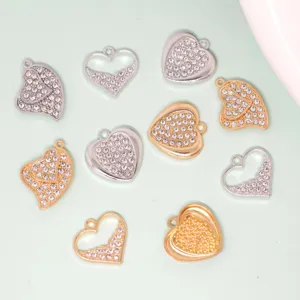 Rhinestone heart charms detail view, silver and gold metal DIY jewelry accessories pendant.