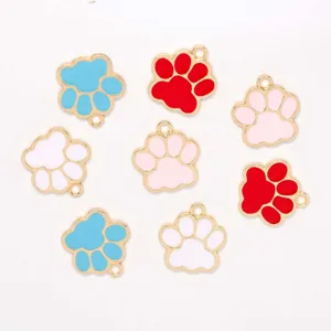 Enamel cat paw charms detail shot, cute gold plated DIY jewelry pendant for bracelets.