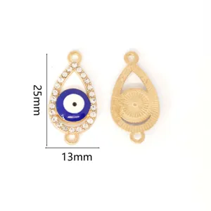 Detail view of evil eye teardrop pendant showcasing rhinestones, blue enamel, and size 25x13mm.