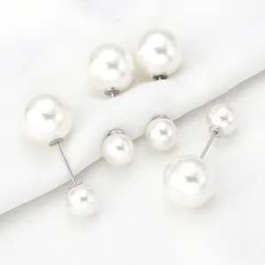 Pearl brooch pin DIY accessory detail view, elegant white faux pearl decorative item.